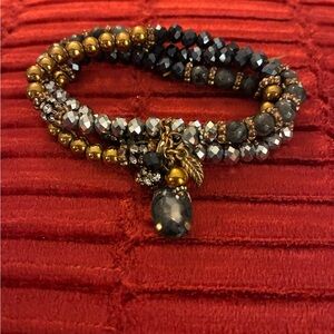 Elegant Beaded Bracelet with Charms